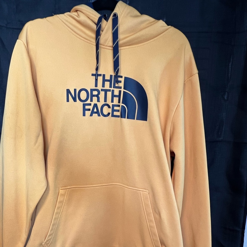 Yellow and blue north face hoodie. Great condition